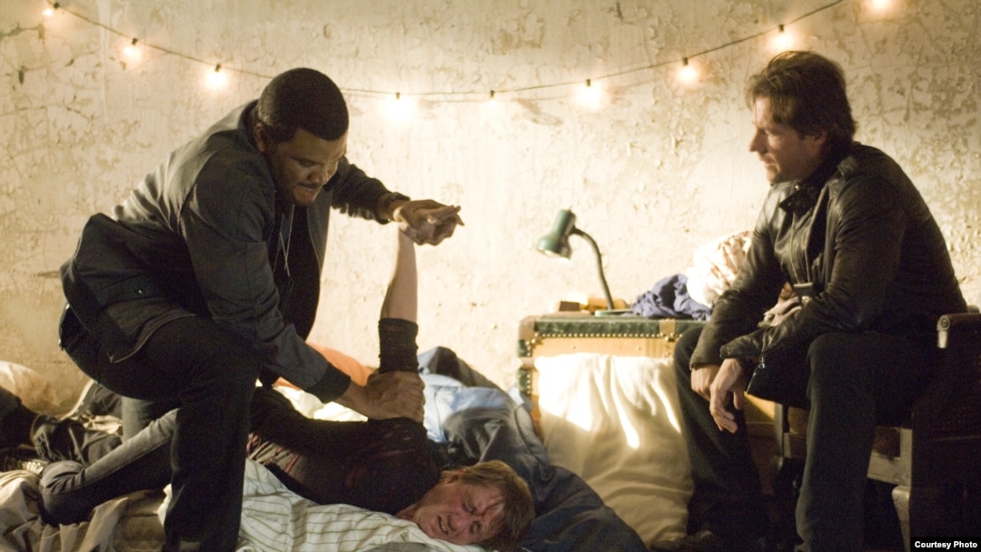 TYLER PERRY (left) and EDWARD BURNS (right) star in ALEX CROSS
