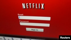 The Netflix sign on is shown on an iPad in Encinitas, California, April 19,2013. Netflix Inc reported on April 22, 2013 a first-quarter profit that beat Wall Street expectations as the dominant video rental service added new streaming subscribers in the 