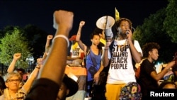 FILE - A Black Lives Matter protester addresses fellow protesters near the site of Democratic National Convention in Philadelphia, Pennsylvania, U.S., July 26, 2016. 