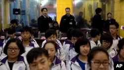Des étuadiants chinois à Pékin, Chine, 4 décembre 2014.