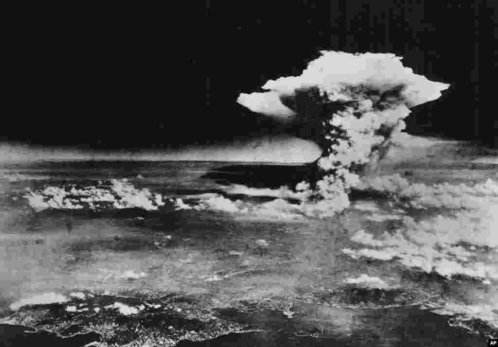 In this Aug. 6, 1945 photo released by the U.S. Army, a mushroom cloud billows about one hour after a nuclear bomb was detonated above Hiroshima.
