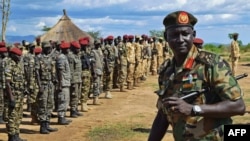 FILE - Brigadier General Lul Ruai Koang, the Sudan People's Liberation Army spokesman, is seen outside Juba, South Sudan, April 14, 2016.