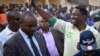 Presidential candidate Frank Habineza (center-right), of the opposition Democratic Green Party greets supporters at an election campaign rally in Musanze District, Rwanda, July 28, 2017. 