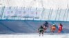 Canada's Brady Leman, Canada's Kristofor Mahler, Russia's Igor Omelin, and Switzerland's Alex Fiva in action during the men's ski cross at the FIS Ski Cross World Cup, Genting Snow Park, Zhangjiakou, China, Nov. 27, 2021. 