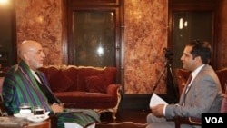 VOA's Ahmad Fawad Lami (right) interviews President Karzai on Monday, July 14 at the Presidential Palace in Kabul. 