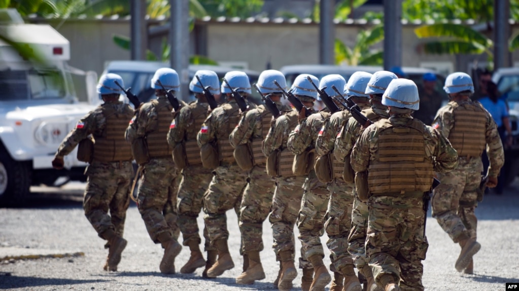 FILE - Chile's Army, part of the United Nations Stabilization Mission in Haiti (MINUSTAH) march in Cap-Haitien, Jan. 24, 2015.