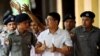 Wa Lone, 33 ans, et Kyaw Soe Oo, 29 ans, qui n'étaient pas présents à l'audience, sont accusés d'avoir enfreint la loi sur les secrets d'Etat, qui date de l'époque coloniale.