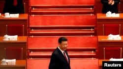 中国领导人习近平抵达北京人大会堂参加全国人大会议开幕式。(2018年3月5日)