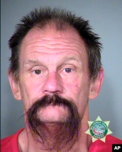 David Dahlman was arrested outside a school in Oregon following a report that a man in a clown mask was chasing kids.