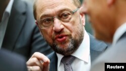 FILE - SPD leader Martin Schulz talks to journalists after a news conference in Berlin, Germany, June 27, 2017. 