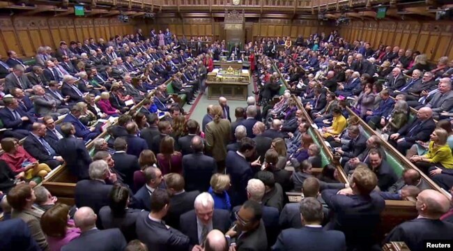 British MPs prepare to vote for the Brexit deal in Parliament in London, Britain, March 12, 2019, in this screen grab taken from video.