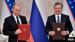 O'zbeksiton rahbari Shavkat Mirziyoyev Rossiya Prezidenti Vladimir Putin bilan. Toshkent, 19-oktabr, 2018. 