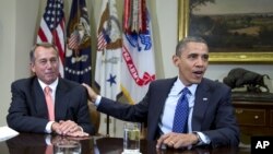 Predsednik Predstavničkog doma Džon Bejner i predsednik Barak Obama (arhivski snimak)