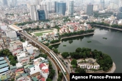 FILE - An aerial photograph shows the first urban metro train running along the Cat Linh-Ha Dong line, in Hanoi, Vietnam, Nov. 6, 2021.