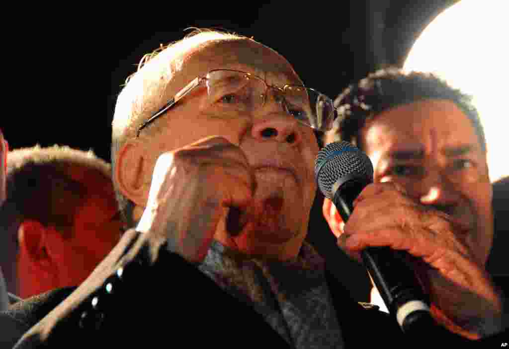 Tunisian presidential candidate Beji Caid Essebsi gives a speech in front his supporters after the second round of the country&#39;s presidential election, in Tunis, Sunday, Dec. 21, 2014.