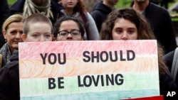 Approximately 100 Portland State University students join a nationwide campus walkout to protest President-elect Donald Trump, Portland, Oregon, November 16, 2016. 