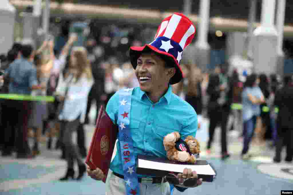 An immigrant from Indonesia, Kali Porter, 34, leaves a naturalization ceremony after becoming a U.S. citizen in Los Angeles, California, May 23, 2017.