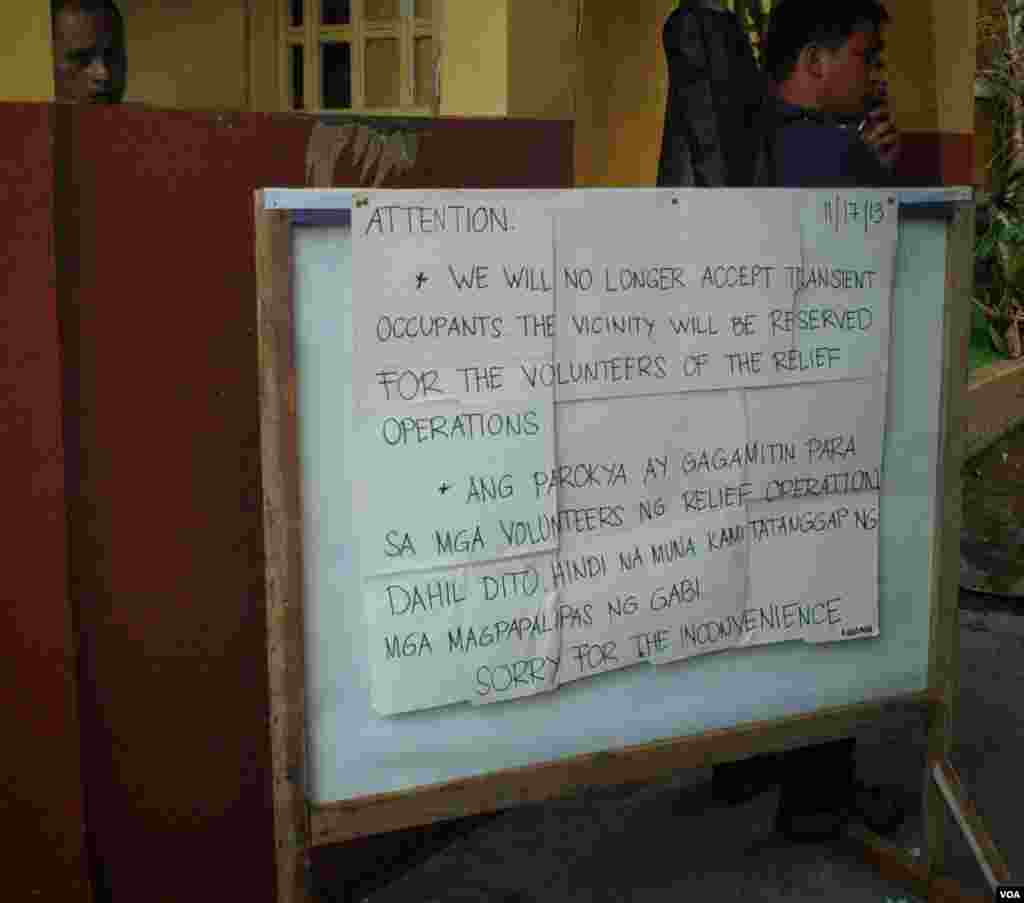 A notice posted at Saints Peter and Paul Parish in Ormoc, Philippines, Nov. 17, 2013. (Steve Herman/VOA)
