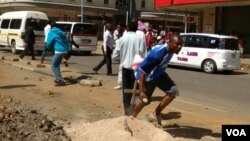 Some of the protesters in running battles with the police.