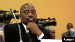 FILE - DRC President Joseph Kabila is seen at a summit in Uganda's capital, Kampala.
