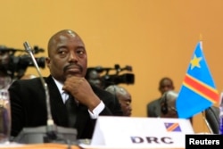 FILE - DRC President Joseph Kabila is seen at a summit in Uganda's capital, Kampala.