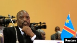 FILE - DRC President Joseph Kabila is seen at a summit in Uganda's capital, Kampala.