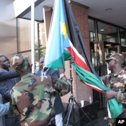 South Sudan's flag was raised in Washington to signal the country's arrival in the international community.