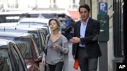 French writer Tristane Banon, who has accused former IMF chief Dominique Strauss-Kahn of attempted rape, with her lawyer, David Koubbi, as they leave his office in Paris, July 5, 2011. (file photo)