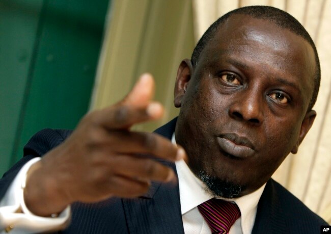 FILE - Cheikh Gadio, minister of foreign affairs of Senegal, speaks at the Swiss Press Club in Geneva, Switzerland, April 28, 2006.