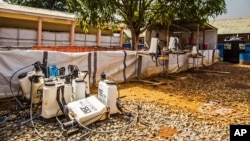 FILE - An Ebola decontamination zone at the Hastings treatment clinic has emptied as the virus shows signs of diminishing in Freetown, Sierra Leone, Jan. 23, 2015