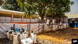 FILE - The Ebola epidemic had shown signs of diminishing in late January, given an empty decontamination zone at the Hastings treatment center in Freetown, Sierra Leone. But the number of new cases is increasing again.