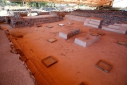 A wide angle view of the Plaza of the Glyphs, a patio with 42 painted signs and symbols on the floor marking the longest Teotihuacan text found so far, dated to probably between 300-400 A.D., at La Ventilla, an extensively excavated neighborhood in the ancient ruins of Teotihuacan, in San Juan Teotihuacan, northeast of Mexico City, Mexico November 7, 2019. Picture taken November 7, 2019. REUTERS/Gustavo Graf