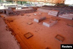 A wide angle view of the Plaza of the Glyphs, a patio with 42 painted signs and symbols on the floor marking the longest Teotihuacan text found so far, dated to probably between 300-400 A.D., at La Ventilla, an extensively excavated neighborhood in the ancient ruins of Teotihuacan, in San Juan Teotihuacan, northeast of Mexico City, Mexico November 7, 2019. Picture taken November 7, 2019. REUTERS/Gustavo Graf