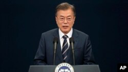 South Korean President Moon Jae-in speaks during a press conference at the presidential Blue House in Seoul, South Korea, May 27, 2018. Moon said Sunday that North Korean leader Kim Jong Un committed in the rivals’ surprise meeting Saturday to sitting down with U.S. President Donald Trump in a summit and to a “complete denuclearization of the Korean Peninsula.”
