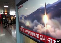 A TV screen shows file footage of North Korea's missile launch during a news program at the Seoul Railway Station in Seoul, South Korea, May 4, 2019.