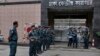 Bangladeshi policemen stand guard outside the Dhaka Central Jail in Dhaka, Bangladesh, June 12, 2016. Police in Bangladesh said Sunday that they have arrested more than 5,000 criminal suspects in the past few days as they continue a nationwide crackdown t