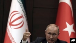 俄罗斯总统普京在土耳其安卡拉与土耳其总统埃尔多安和伊朗总统鲁哈尼举行联合新闻发布会（2019年9月16日）。