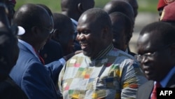 FILE - Rebel leader Riek Machar (C) meets with his supporters at Juba international airport on April 26, 2016. President Salva Kiir has reportedly ordered his troops to have him killed.