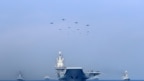 Chiến hạm và chiến đấu cơ của quân đội Trung Quốc phô diễn sức mạnh quân sự trên Biển Đông 