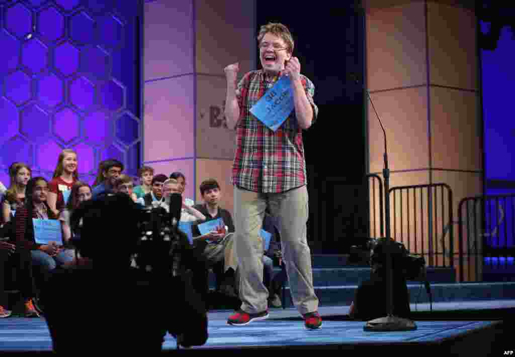 Speller Jacob Daniel Williamson of Cape Coral, Florida, reacts after he correctly spelled a word during round five of the 2014 Scripps National Spelling Bee competition in National Harbor, Maryland.