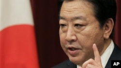 Thủ tướng Nhật Bản Yoshihiko Noda nói chuyện tại một cuộc họp báo ở Tokyo hôm thứ Sau 16/11/12