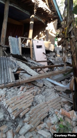 Rumah warga yang rusak setelah gempa 6,4 SR mengguncang Lombok, Bali, dan Sumbawa, Minggu pagi, 29 Juli 2018. (Foto: Humas BNPB)
