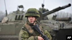 A Russian army soldier takes part in drills at the Kadamovskiy firing range in the Rostov region in southern Russia, Dec. 10, 2021.