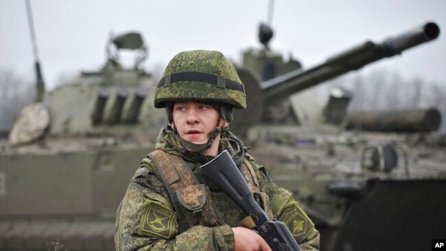 A Russian army soldier takes part in drills at the Kadamovskiy firing range in the Rostov region in southern Russia, Dec. 10, 2021.