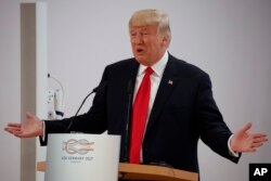 President Donald Trump speaks during the Women's Entrepreneurship Finance event at the G20 Summit, July 8, 2017, in Hamburg, Germany.