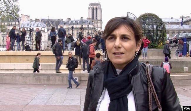 Severine Vilbert believes Notre Dame will be rebuild 'better than ever.' (L. Bryant/VOA)