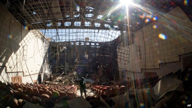 A view of the cultural center, destroyed by shelling during a military conflict, in Shushi, outside Stepanakert, the separatist region of Nagorno-Karabakh, Tuesday, Oct. 13, 2020. (AP Photo)