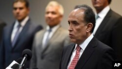 Felipe de Jesus Munoz Vazquez, Mexico's deputy attorney general for the Specialized Investigation of Federal Crimes unit, speaks at a news conference, Aug. 15, 2018, in Chicago. U.S. DEA officials unveiled some additional strategies in combating Mexican drug cartels Wednesday, alongside members of the Mexican government, military and federal police, who said one of their priorities was to capture the leader of the increasingly powerful Jalisco New Generation Cartel. 