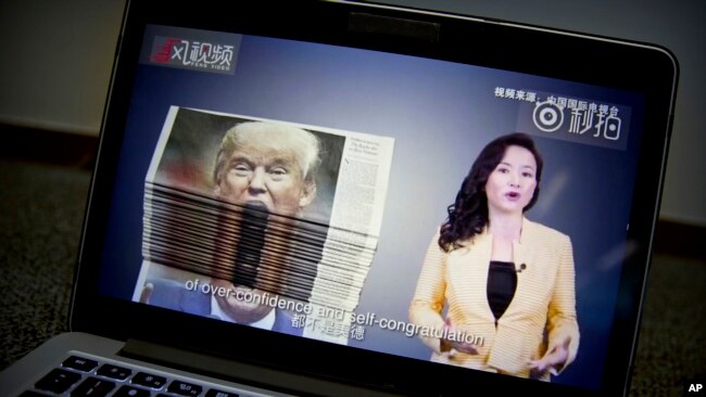 通过网络播放的中国国际电视台的一段有关美中贸易紧张关系的视频（2018年8月23日） 