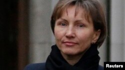 Marina Litvinenko leaves London’s High Court after testifying during an inquiry into the 2006 murder of her husband, KGB agent Alexander Litvinenko, on Feb. 2, 2015.